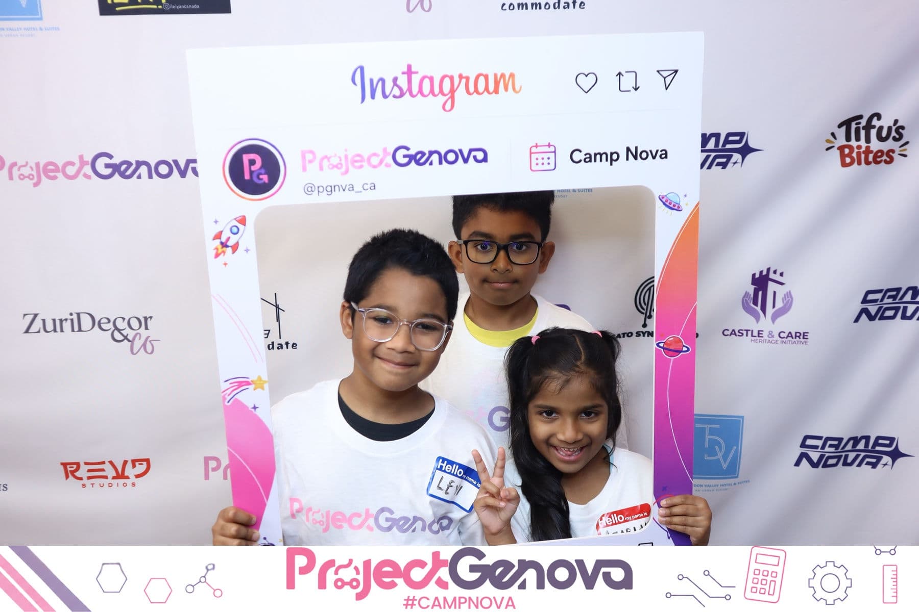 A group of campers and volunteers at the Camp Nova photo wall