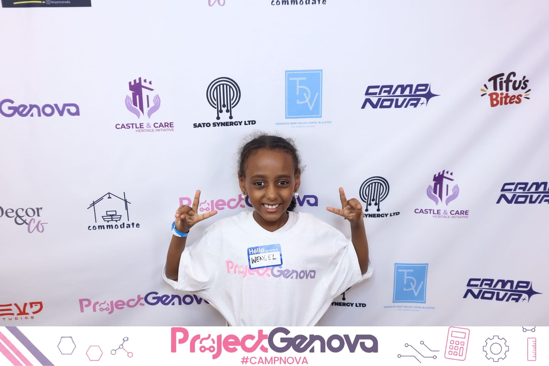 Campers posing together at the Camp Nova photo booth